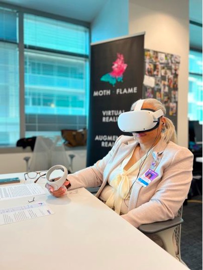A Wellstar Team Member using VR Training tools provided by Moth + Flame